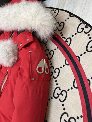 Moose Knuckles Women's Long Hooded Parka with Pom-Pom Details