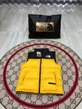 The North Face Unisex Color-Block Puffer Vest in Yellow
