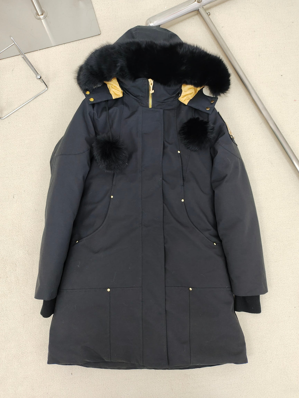 Moose Knuckles Women's Long Hooded Parka with Pom-Pom Details