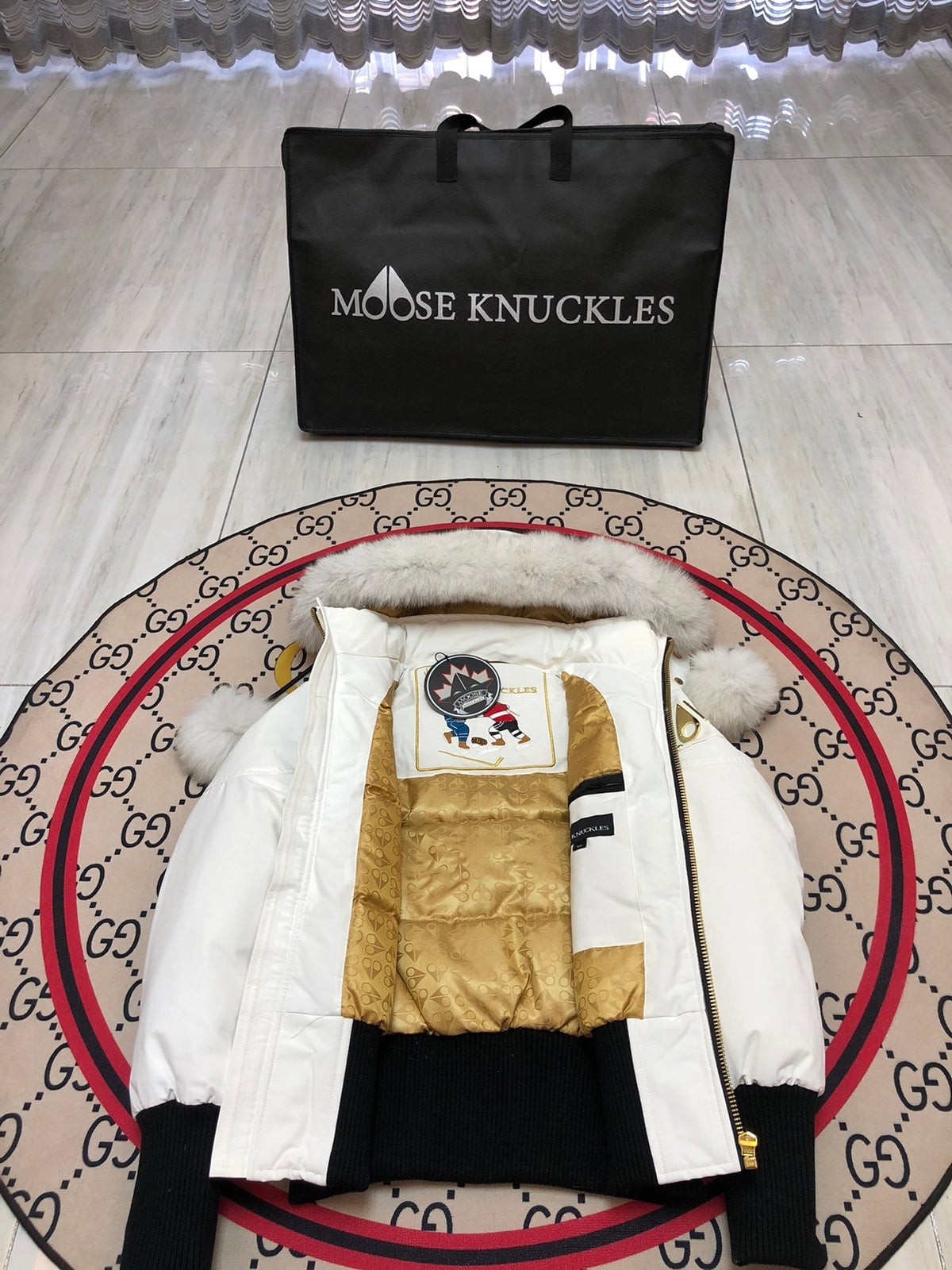 Moose Knuckles Women's Hooded Bomber Jacket with Pom-Pom Details