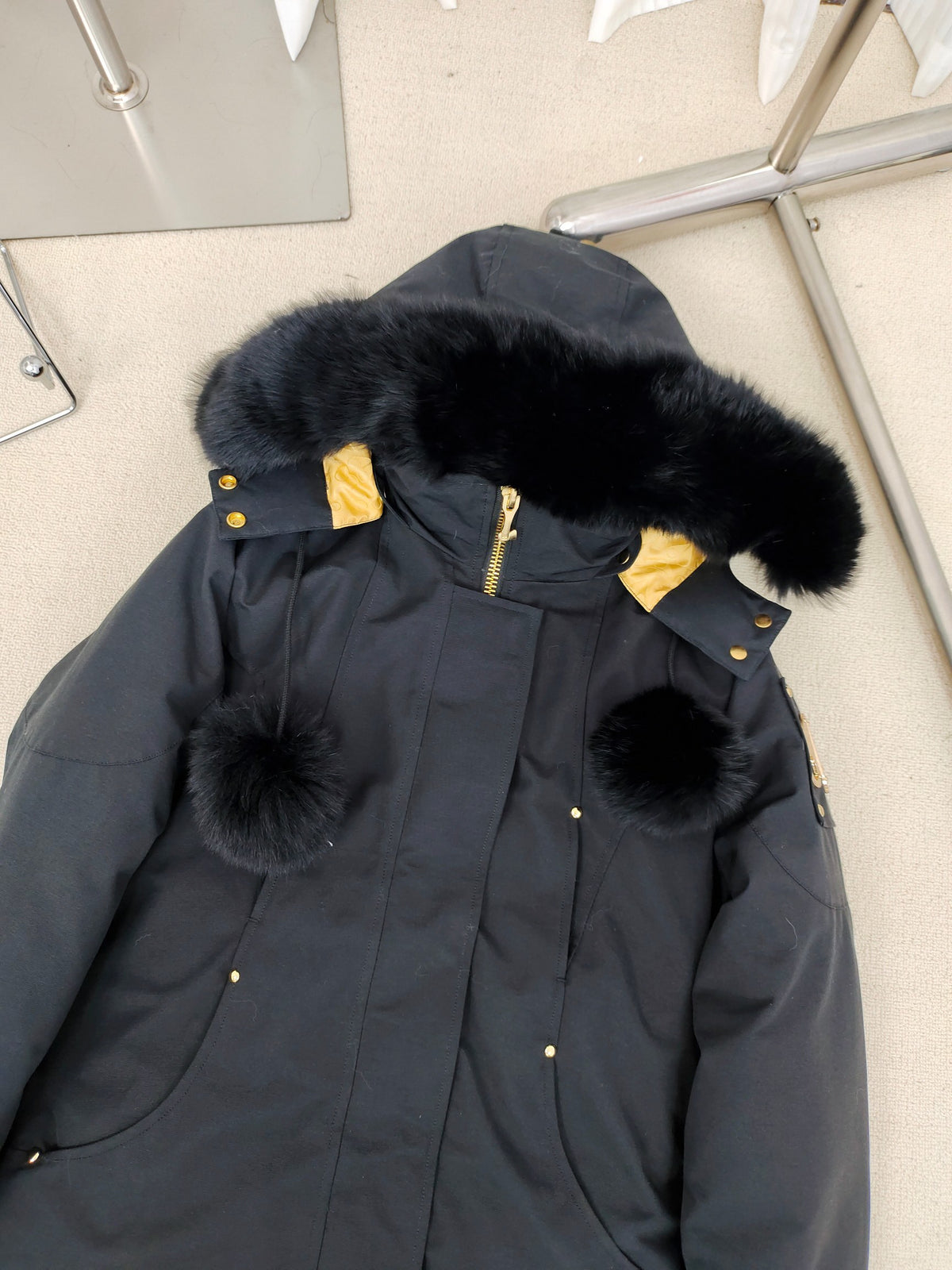 Moose Knuckles Women's Long Hooded Parka with Pom-Pom Details