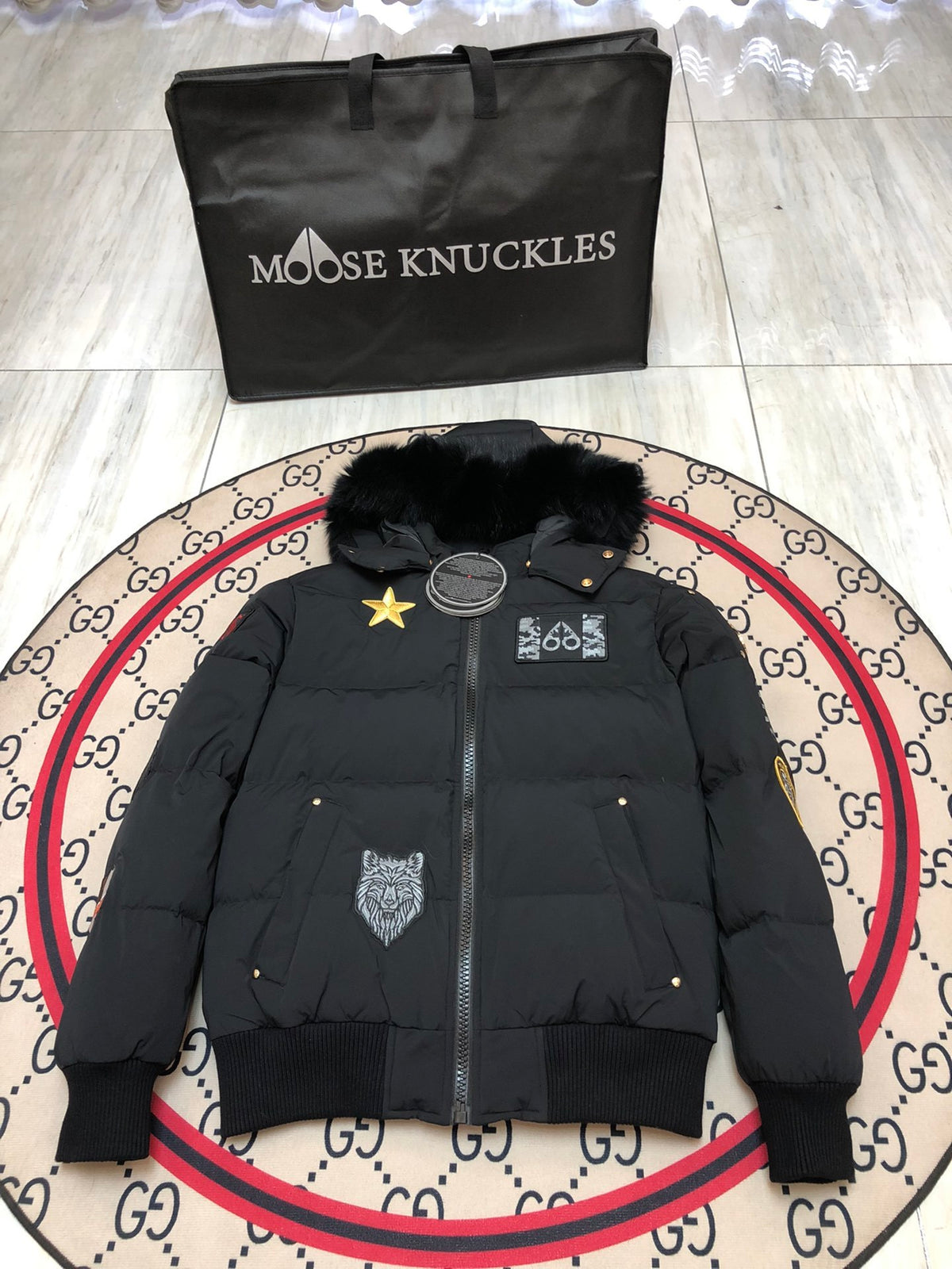 Moose Knuckles Black Hooded Puffer Jacket with Graphic Patches