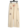 Balenciaga Tattoo-Style Graphic Wide-Leg Trousers - Cream